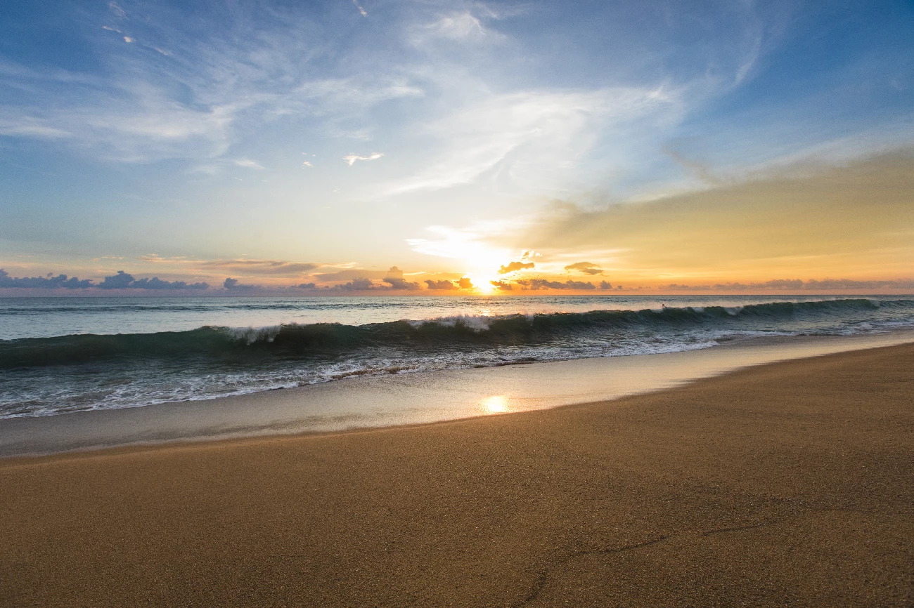 ocean waves crashing on sand